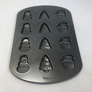 Wilton 12 Cup‎ Christmas Holiday Baking Pan Snowman Tree Santa Claus Molds